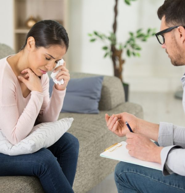 Tearful,Woman,Talking,To,A,Therapist Tearful,Woman,Talking,To,A,Therapist